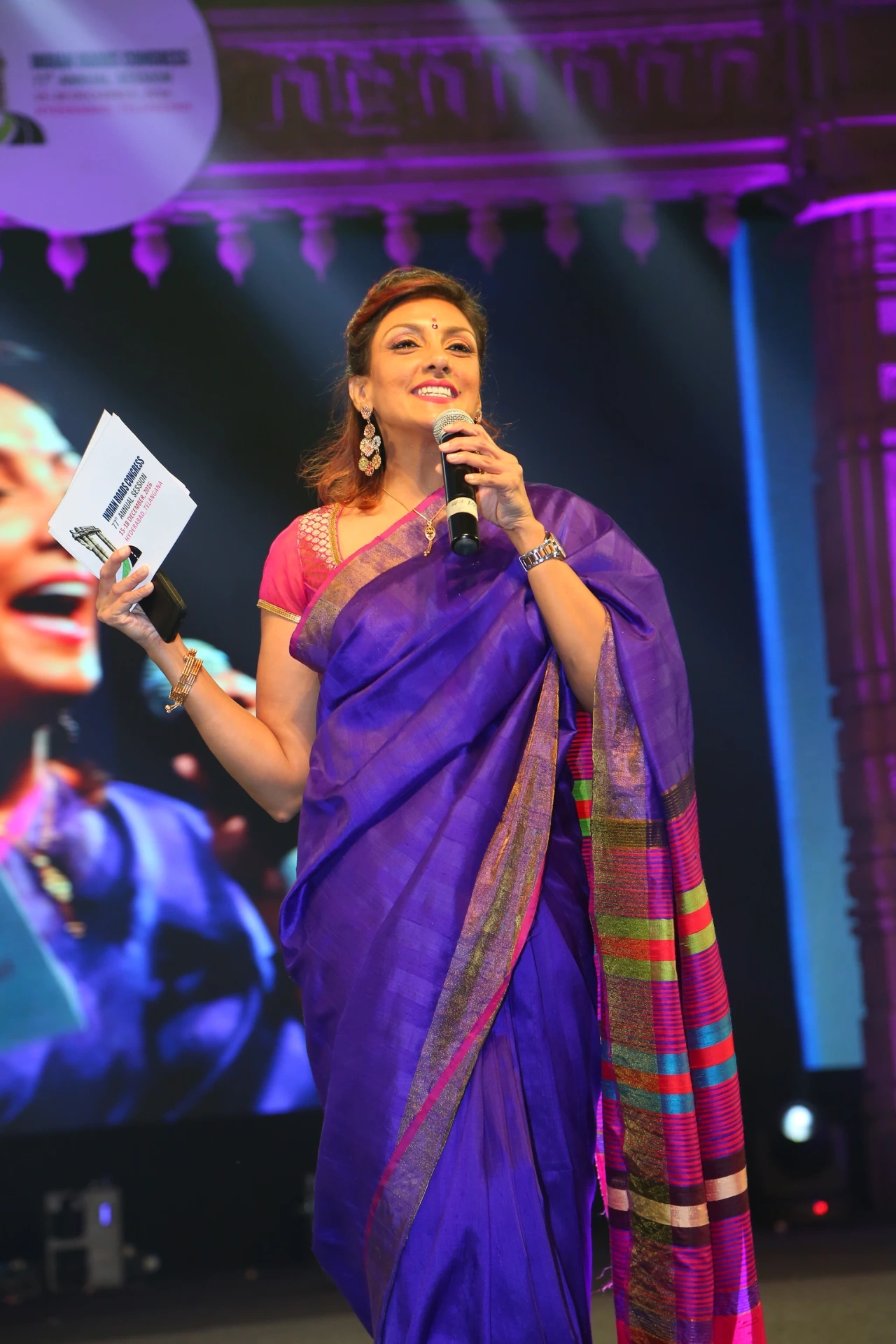 Pallavii on stage at the Indian Roads Congress in a regal saree